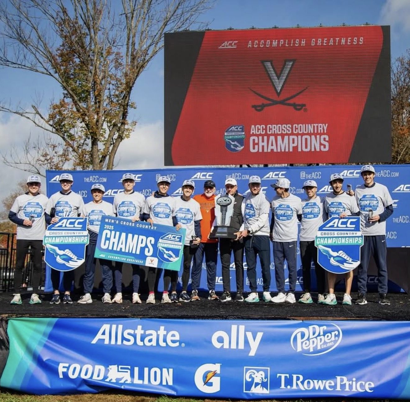 Virginia cross country team with ACC Championship banners