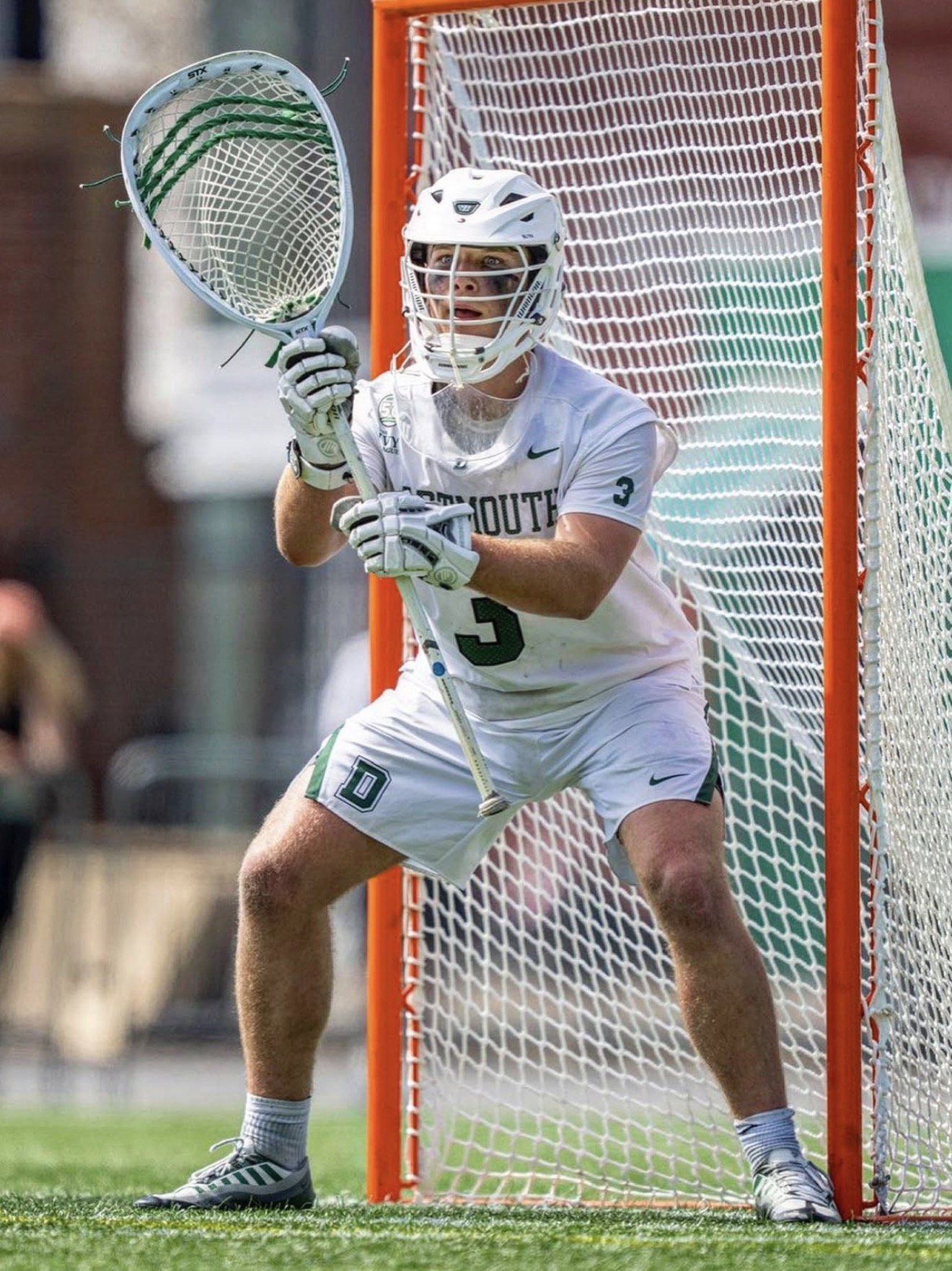 Sam Cooper in a goalie stance for Dartmouth